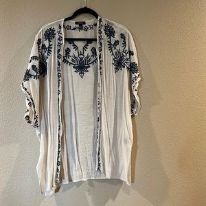 Sheer kimono style with dark blue embroidery